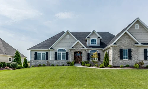 ranch style home with nice front lawn