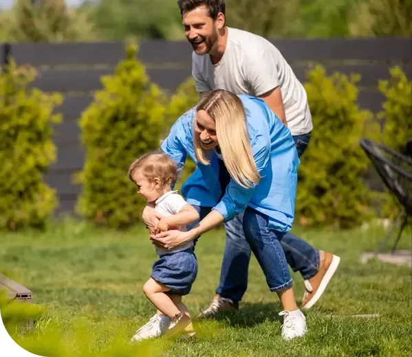 family playing in yard